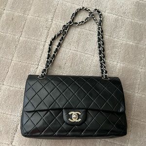 Chanel Vintage Medium Double Flap Bag in Black with Silver hardware.